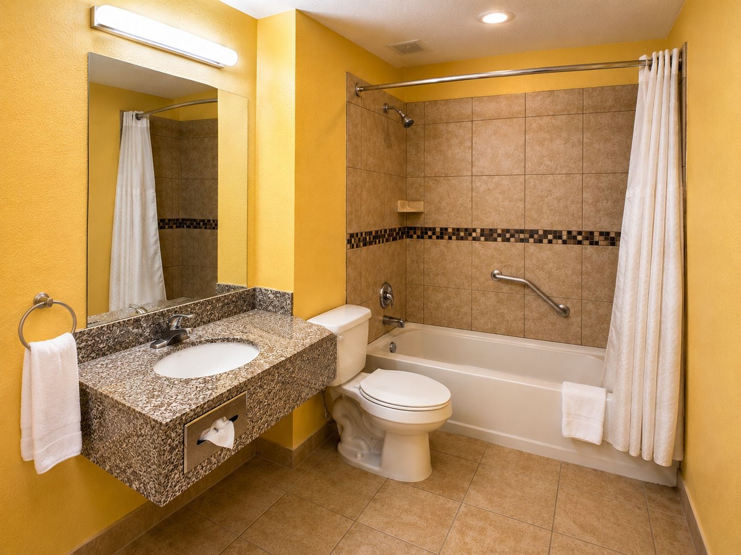 Un baño con lavabo, inodoro y bañera.