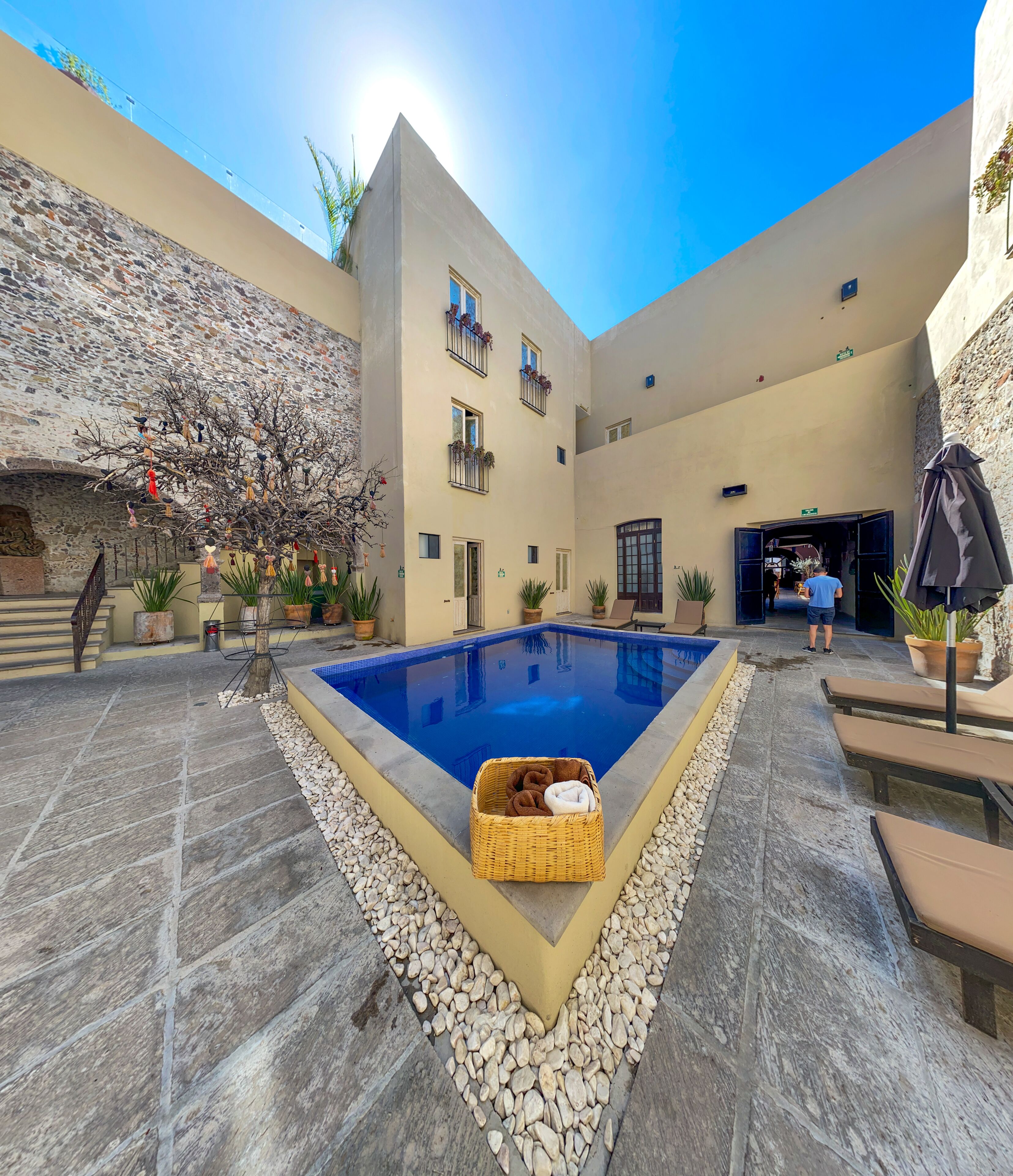 Outdoor pool, open 10:00 AM to 8:00 PM, free cabanas, pool umbrellas