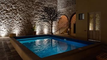 Outdoor pool, open 10:00 AM to 8:00 PM, free cabanas, pool umbrellas