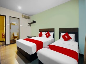 ห้องดีลักซ์ทริปเปิล | Wi-Fi ฟรี, ผ้าปูที่นอน