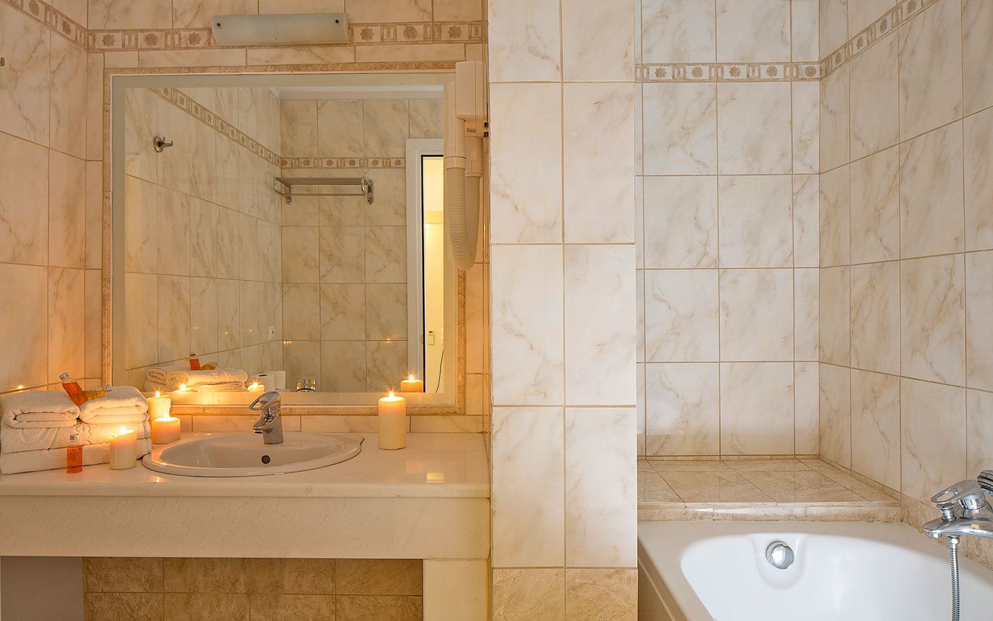 hair dryer, towels, soap, shampoo