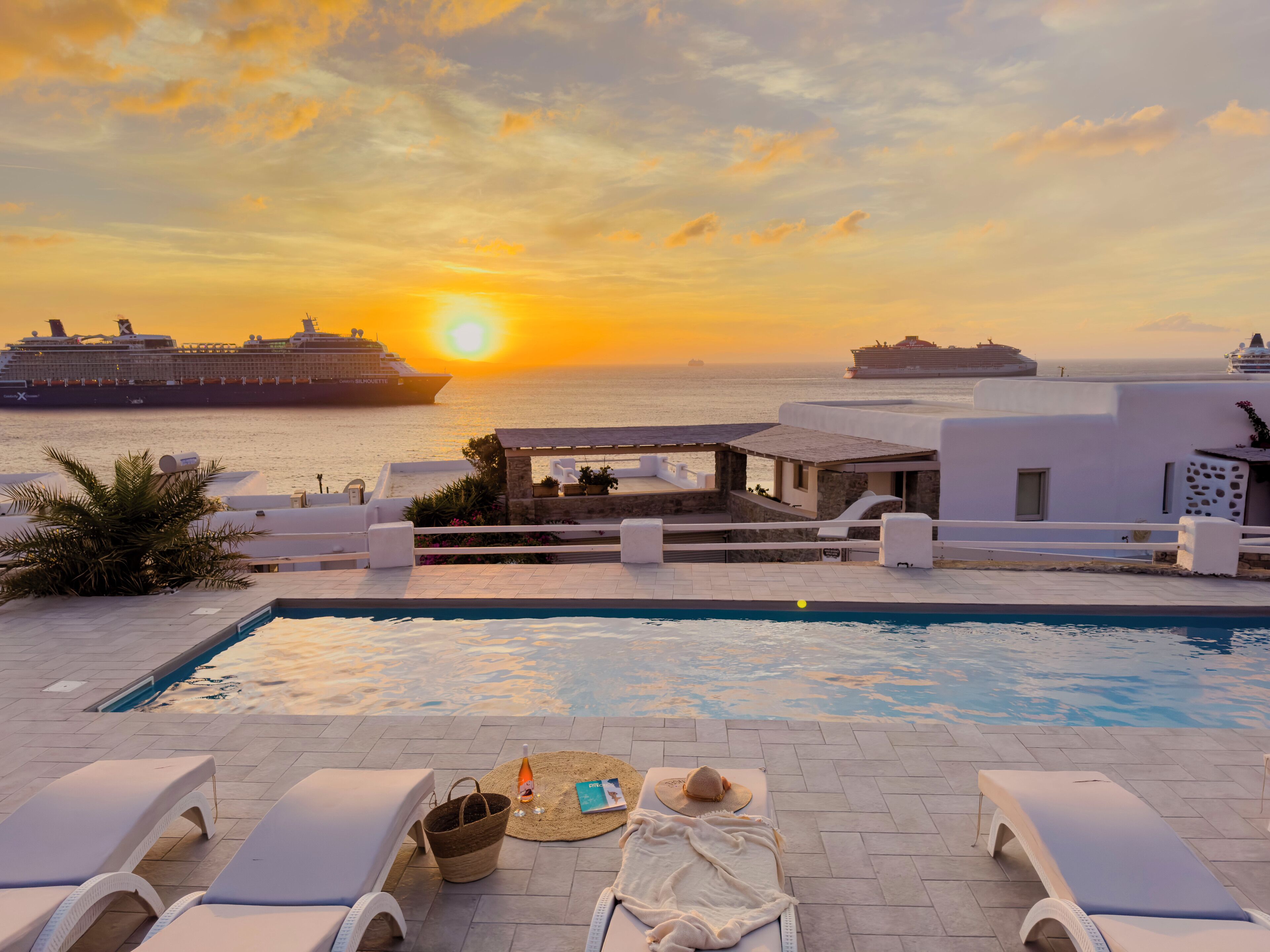 Outdoor pool, open 7:30 AM to 10:00 PM, sun loungers