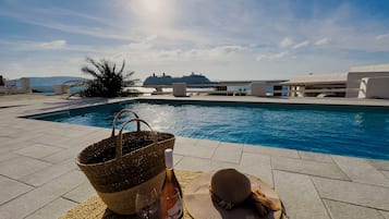 Outdoor pool, open 7:30 AM to 10:00 PM, sun loungers