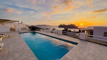 Outdoor pool, open 7:30 AM to 10:00 PM, sun loungers