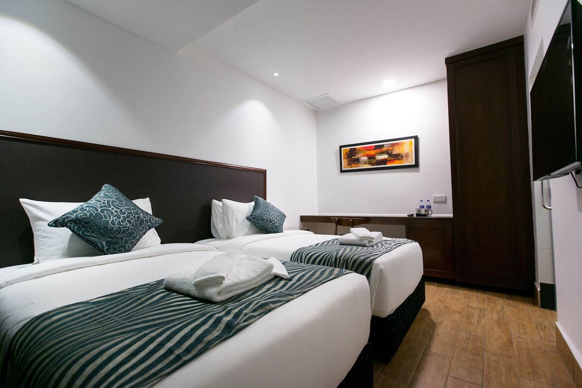 In-room safe, desk, blackout curtains, iron/ironing board