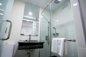 Premier Room | Bathroom | Rainfall showerhead, free toiletries, hair dryer, towels