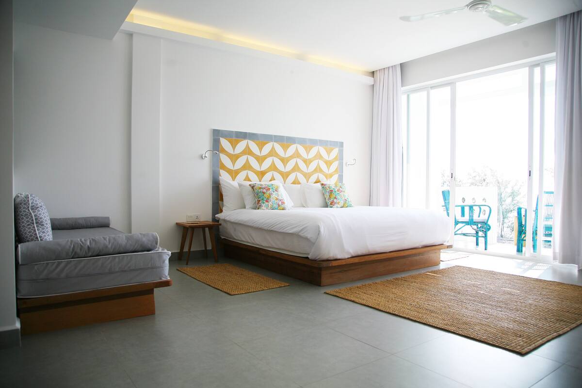 Junior Suite, Balcony, Sea View | Down comforters, minibar, in-room safe, desk