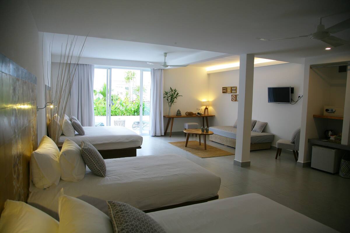 Family Suite, Garden View | Down comforters, minibar, in-room safe, desk