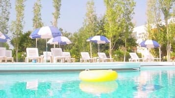 Outdoor pool, pool umbrellas, pool loungers