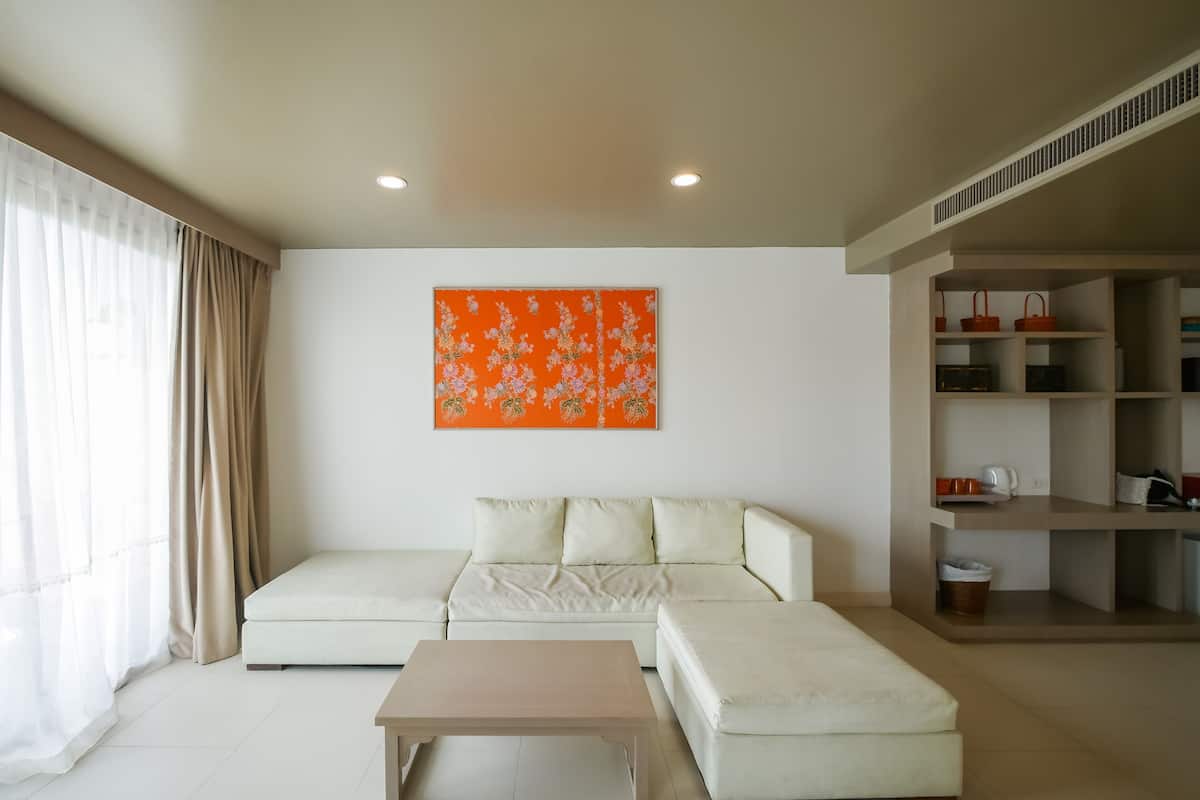 junior suite pool view | 1 bedroom, in-room safe, desk, free wifi
