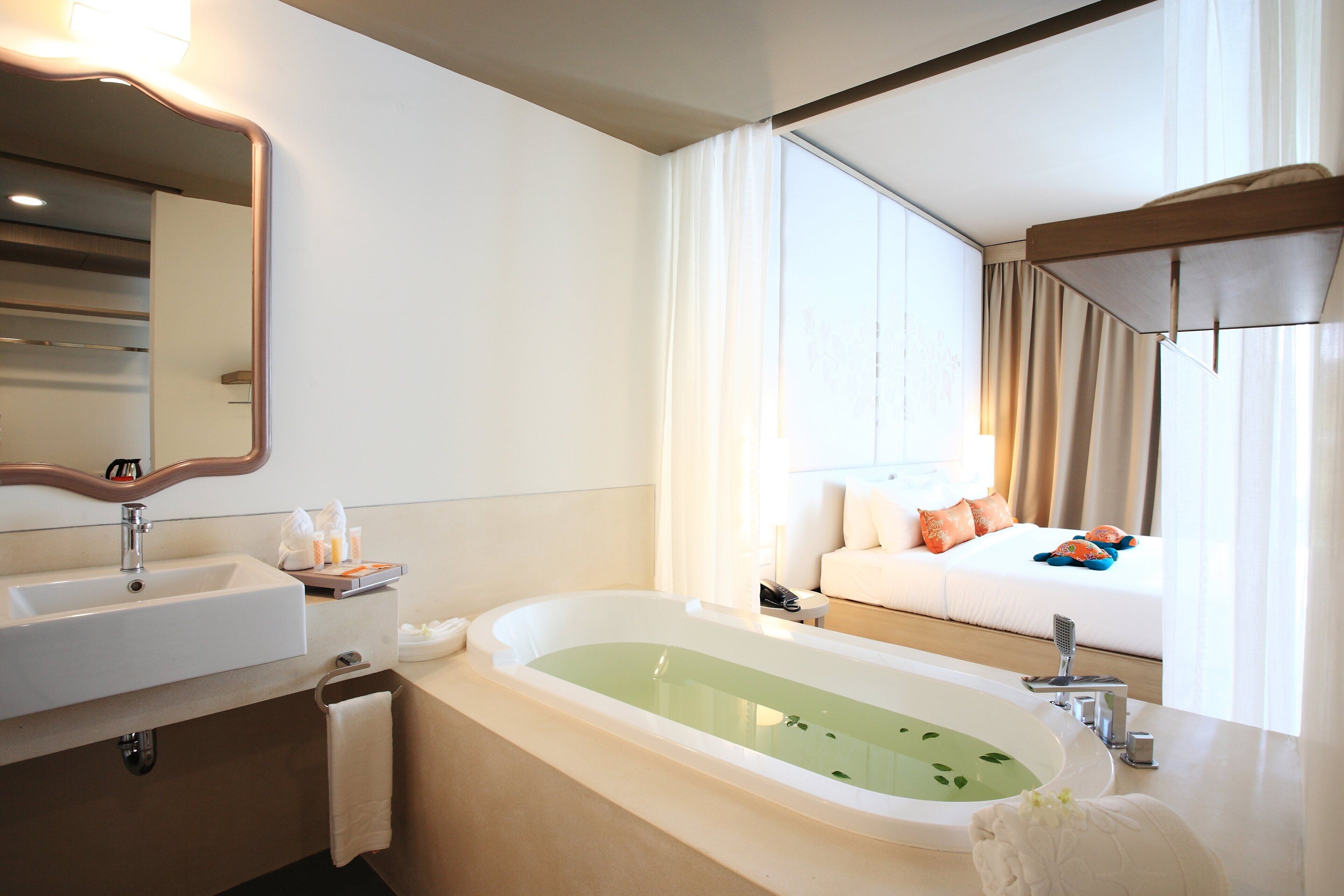 separate bathtub and shower, free toiletries, hair dryer, bathrobes