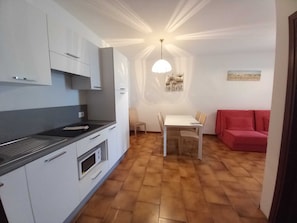 Classic Studio | Living area | TV - Residence Oasi (Limone sul Garda)