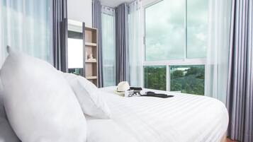 Minibar, desk, blackout drapes, soundproofing