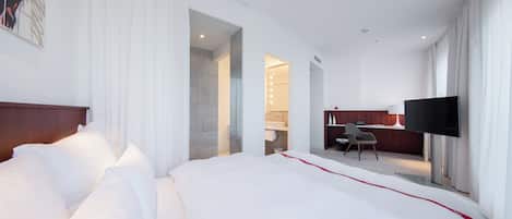 Premium bedding, pillow-top beds, in-room safe, desk