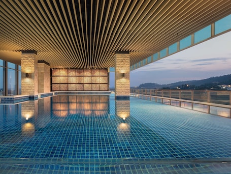 Indoor pool, outdoor pool, pool umbrellas