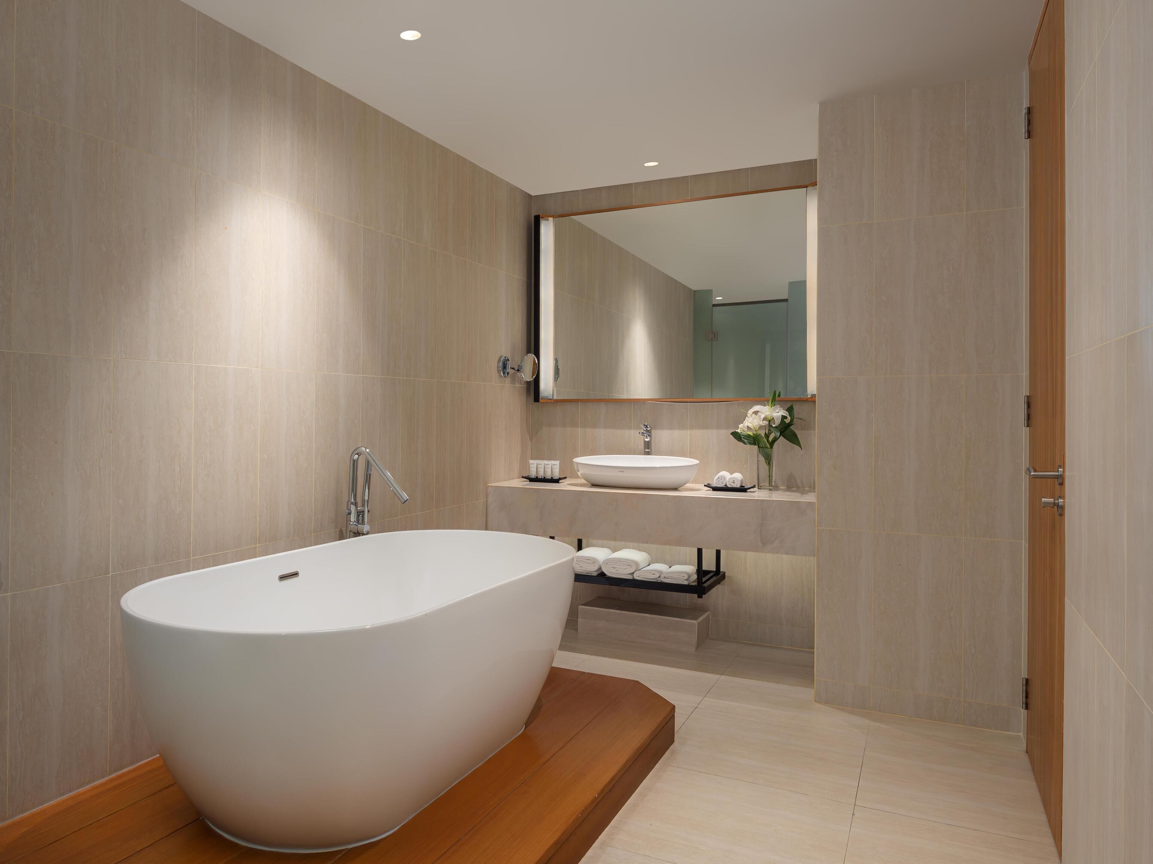 Suite, 1 Bedroom, City View | Bathroom | Eco-friendly toiletries, hair dryer, bathrobes, slippers