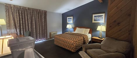 Habitación estándar, 1 cama Queen size, vista al lago | Escritorio, tabla de planchar con plancha, wifi gratis y ropa de cama