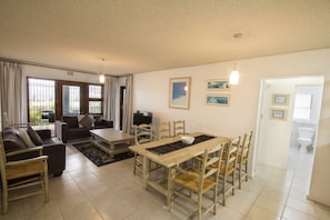 Apartment (Ground Floor) | Living area | Flat-screen TV