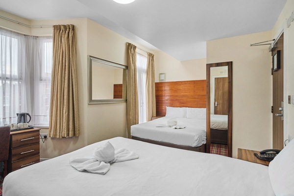 Superior Quadruple Room | In-room safe, desk, blackout drapes, soundproofing