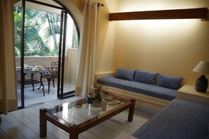 Suite, 1 Bedroom | Living room | 32-inch flat-screen TV with cable channels, LCD TV