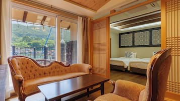 Suite, 1 cama doble, vistas al mar | 1 dormitorio, cortinas opacas, sistema de insonorización y wifi gratis