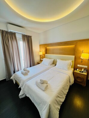 Quarto standard | Cofres nos quartos, ferros/tábuas de passar roupa, berços grátis