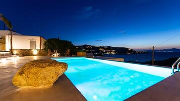 Seasonal outdoor pool, open 9:00 AM to 9:00 PM, sun loungers