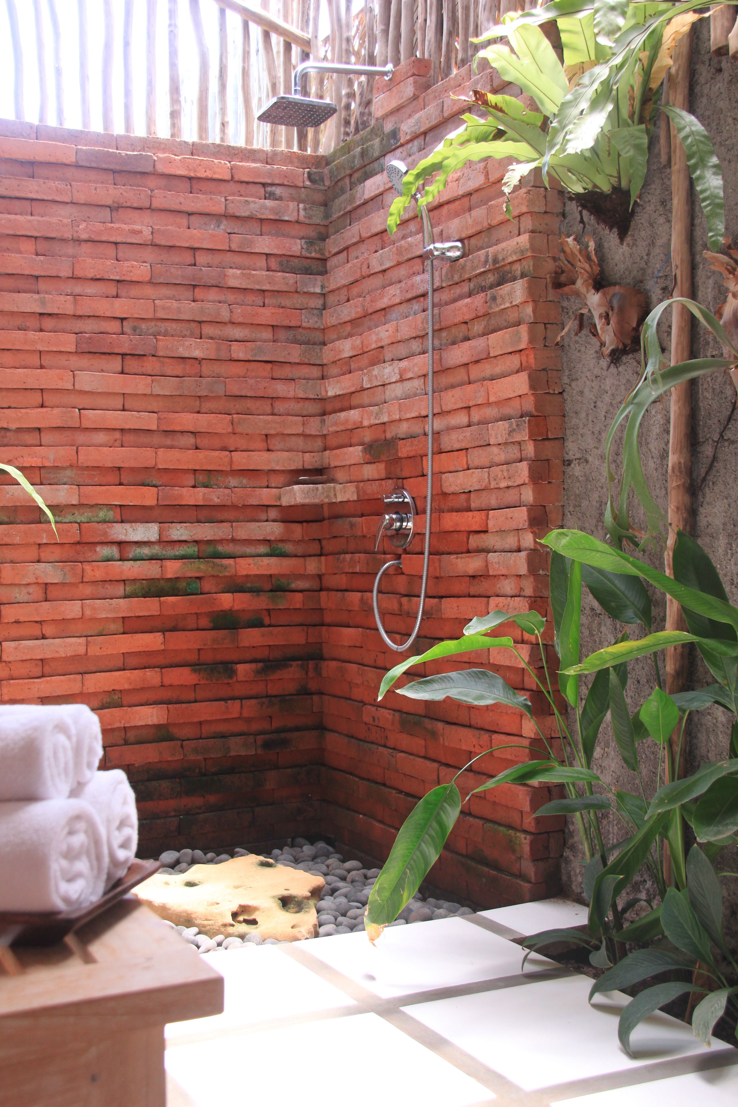 deluxe room | bathroom | shower, free toiletries, hair dryer, bathrobes