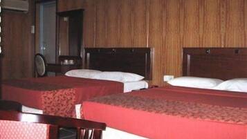 Family Room | Desk, iron/ironing board, rollaway beds, bed sheets