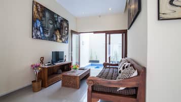 Villa, 1 Bedroom (with Private Jaccuzzi) | Living area | 40-inch LED TV with satellite channels, TV