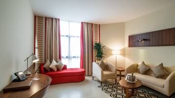 Junior Suite, 1 Bedroom | Living area | Flat-screen TV, fireplace