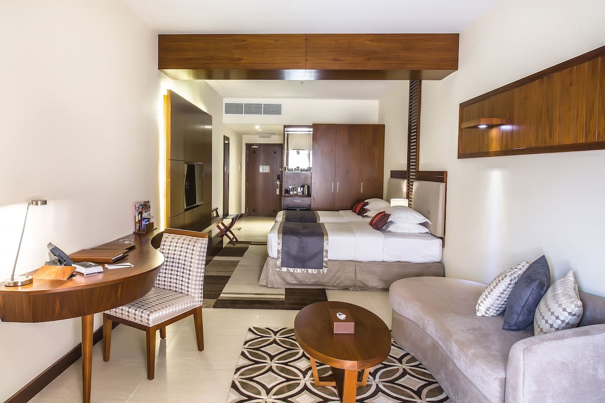 standard room | living area | flat-screen tv, fireplace