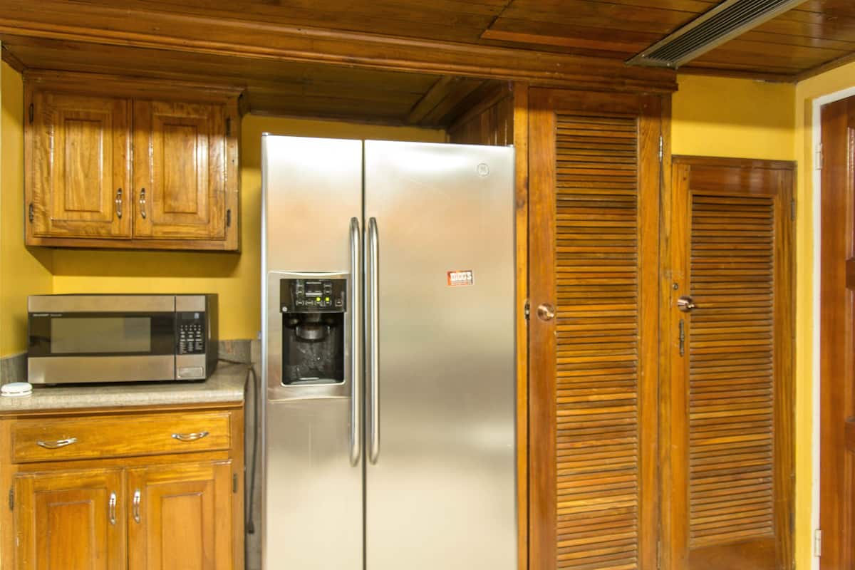 Standard Apartment | Private kitchen | Full-size fridge, stovetop, coffee/tea maker