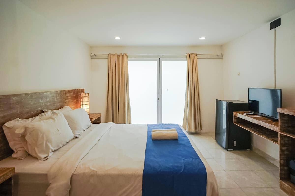 Deluxe Room Outdoor Shower | 1 slaapkamer, een kluis op de kamer, een bureau, gratis wifi