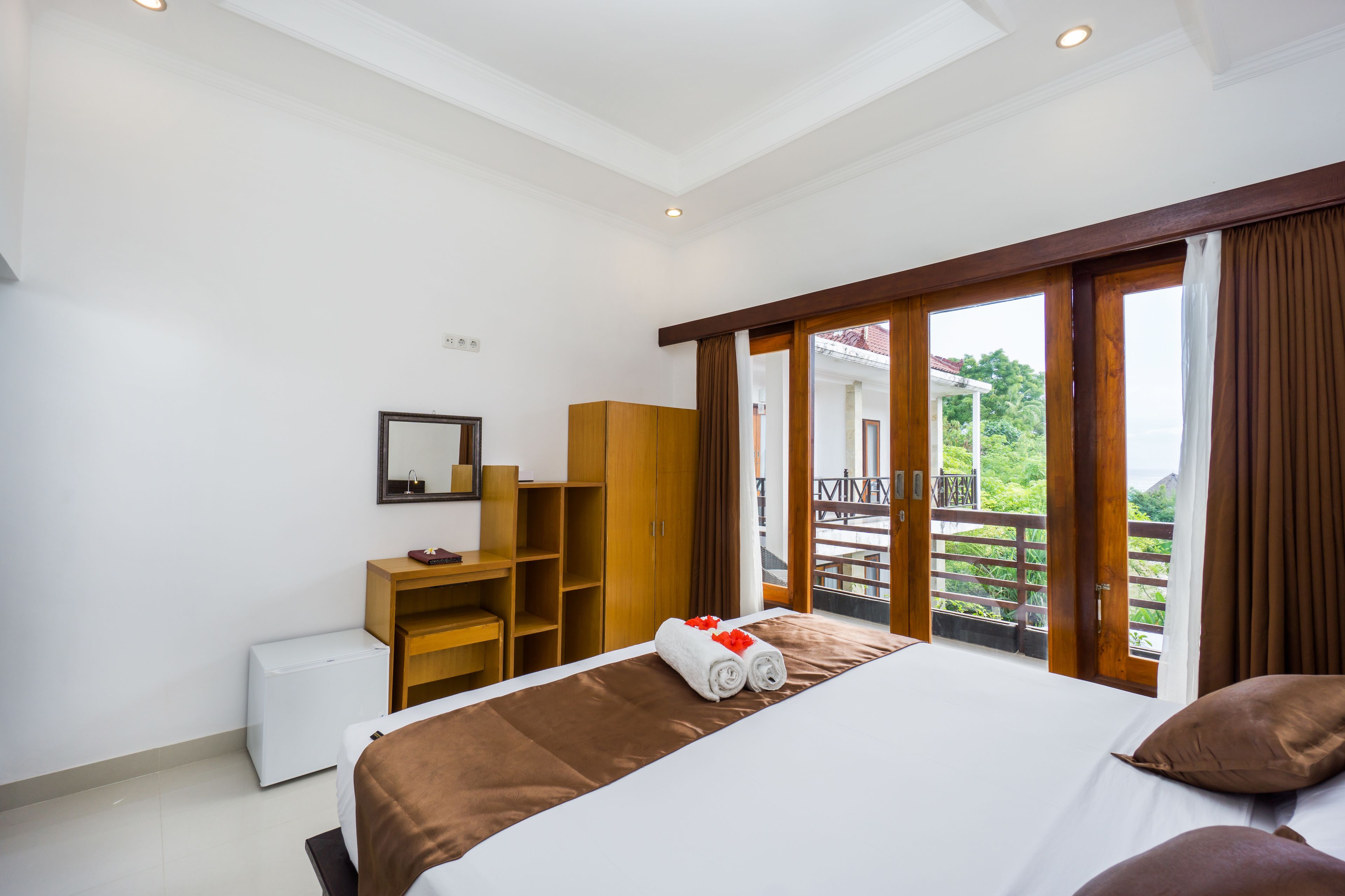 deluxe double room, ocean view | premium bedding, in-room safe, desk, free wifi