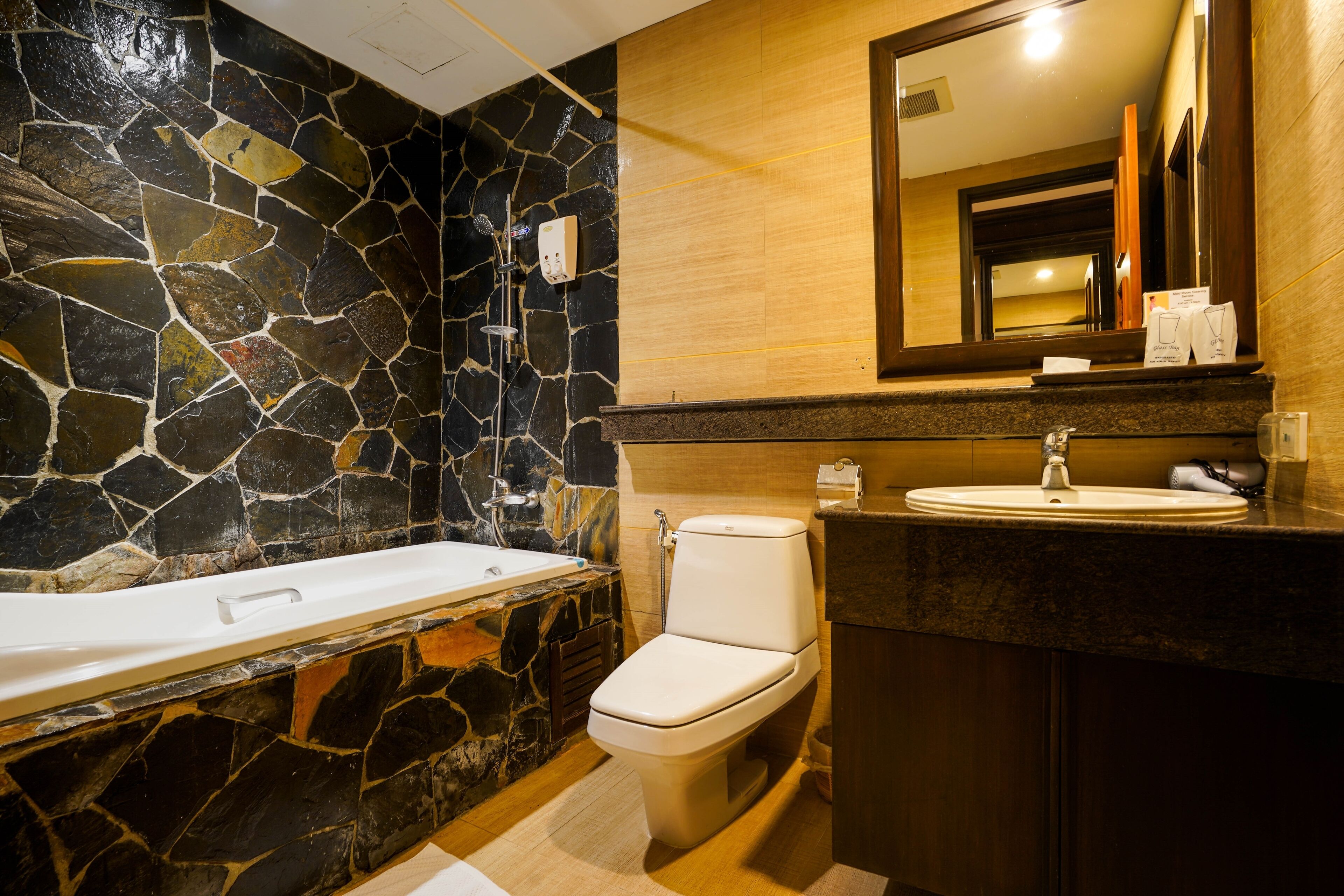 deluxe double room | bathroom | free toiletries, hair dryer, towels