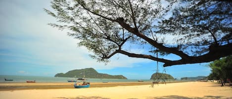 On the beach, kayaking