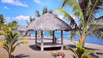 Private beach, white sand, free beach cabanas, sun-loungers