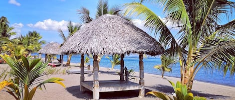 Private beach, white sand, free beach cabanas, sun-loungers