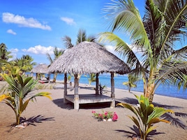 Private beach, white sand, free beach cabanas, sun loungers