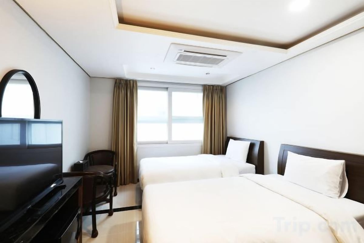 Desk, blackout drapes, iron/ironing board (on request), WiFi (free)