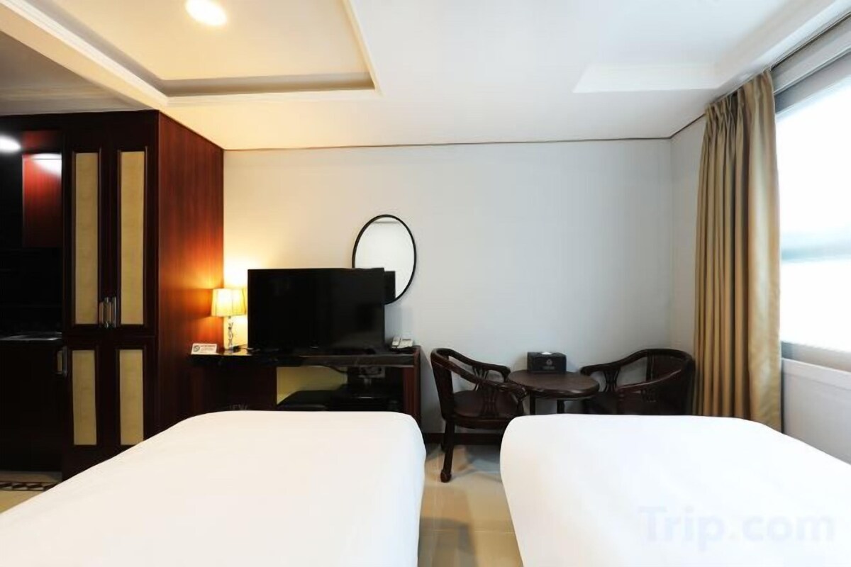 Desk, blackout drapes, iron/ironing board (on request), WiFi (free)