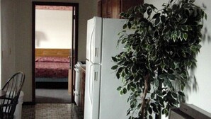 Apartment, 1 Bedroom, Smoking (1 King Bed, 1 Queen Bed, Kitchen) | Private kitchen | Fridge, microwave - Double A Motel (Fremont)