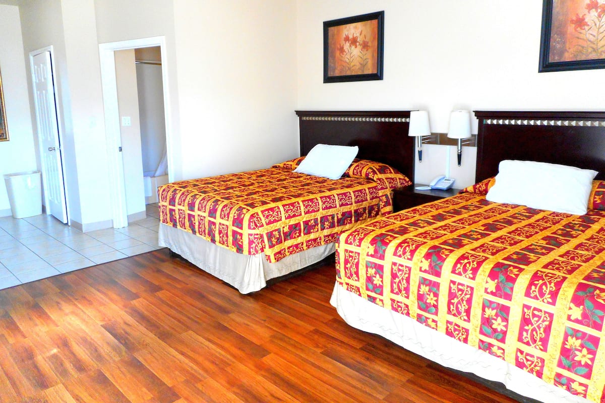 Standard Room, 2 Queen Beds, Non Smoking | Desk, iron/ironing board, free WiFi, bed sheets