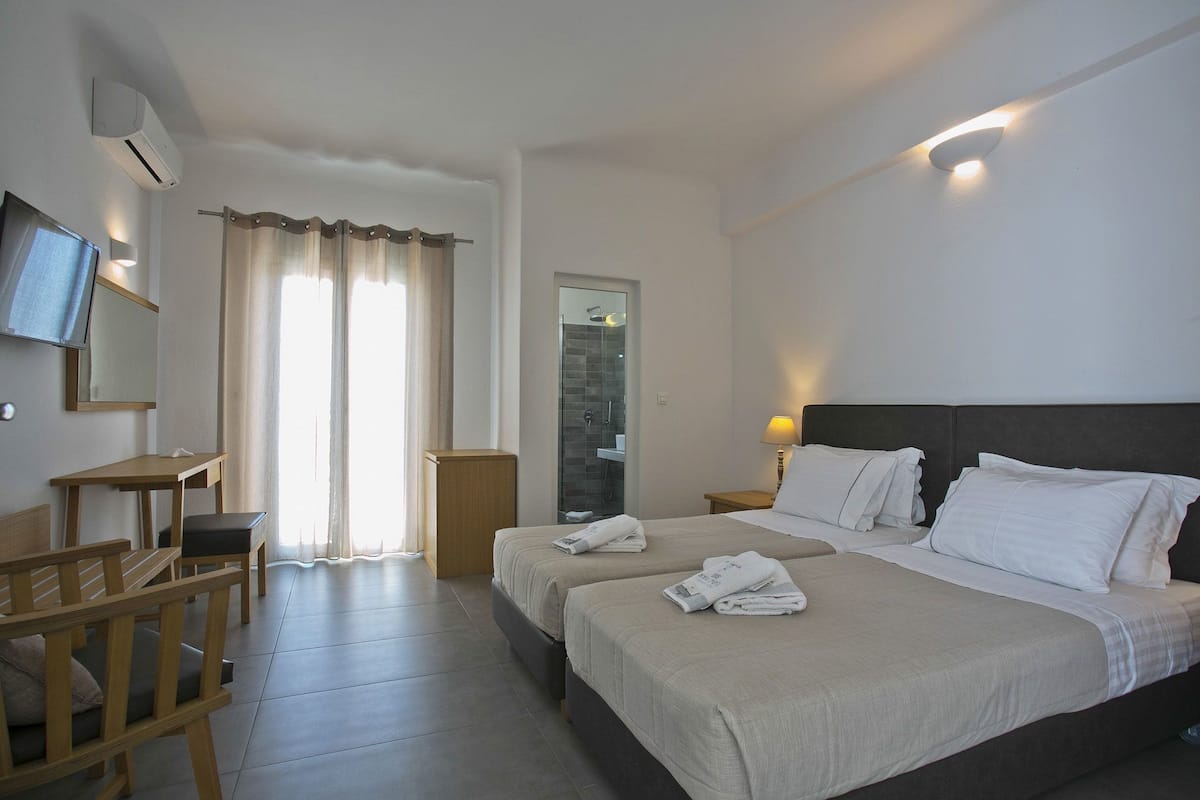 Standard Double Room | Minibar, iron/ironing board, free cribs/infant beds, free WiFi