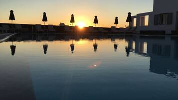 Outdoor pool, pool umbrellas, sun loungers