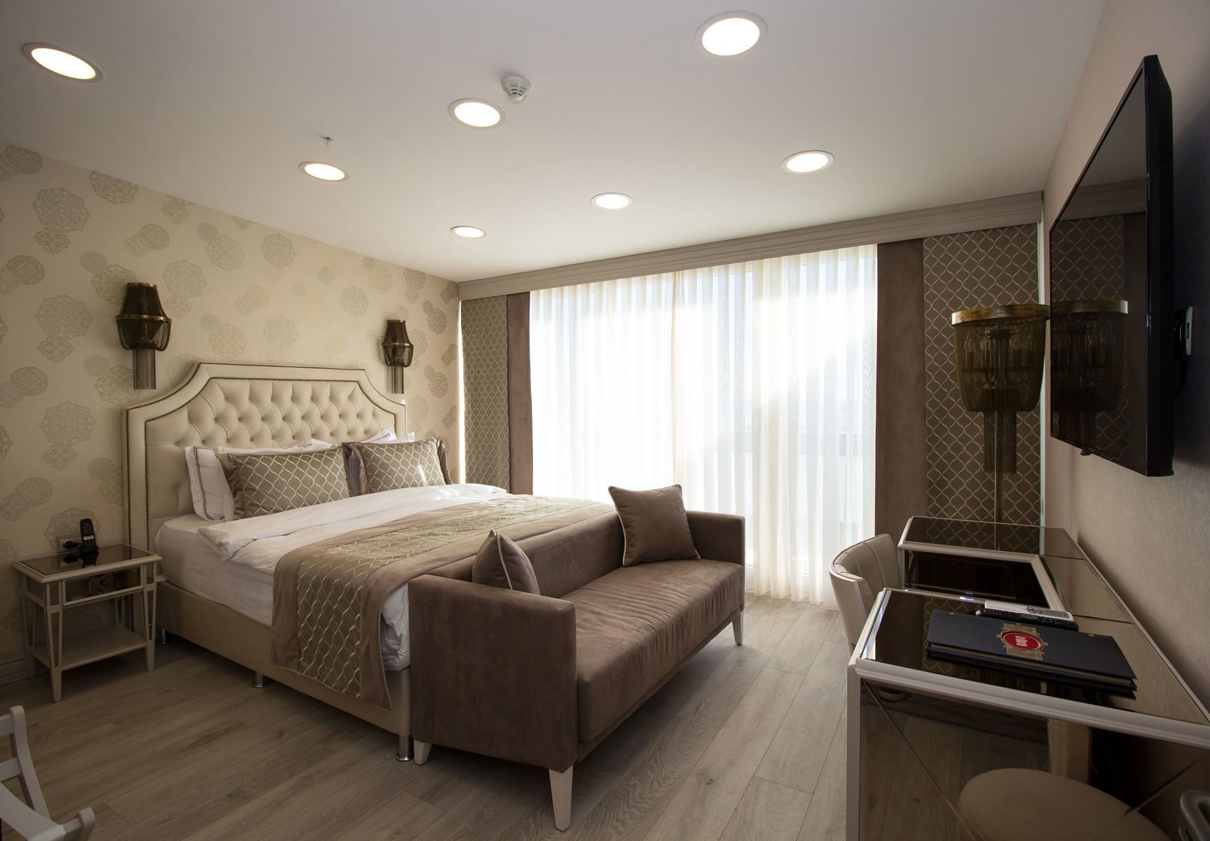 Premium bedding, down comforters, minibar, in-room safe