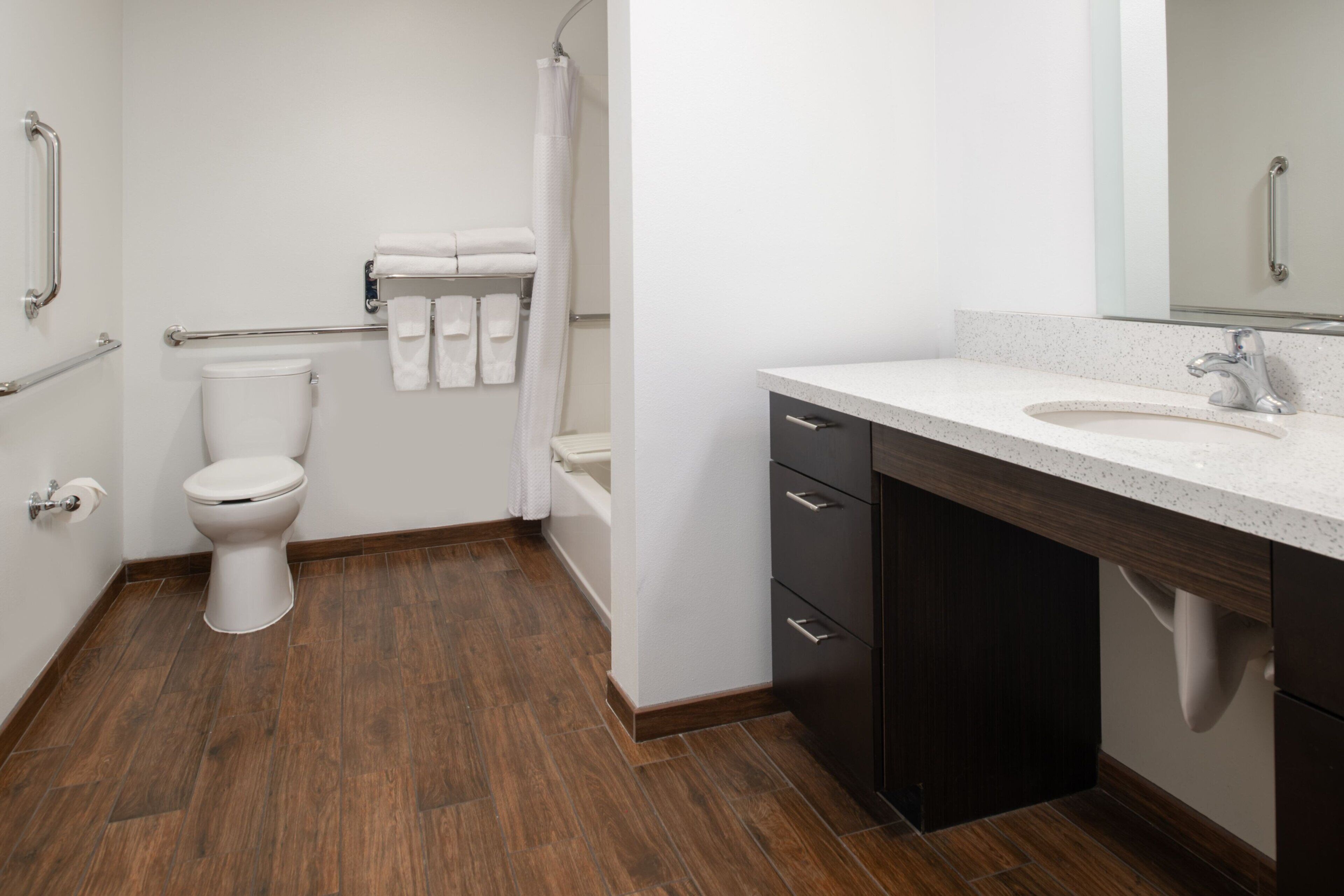 Combined shower/tub, designer toiletries, hair dryer, towels