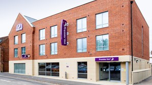 A brick building with multiple windows and a sign for Premier Inn. - Premier Inn Hitchin Town Centre (Hitchin)