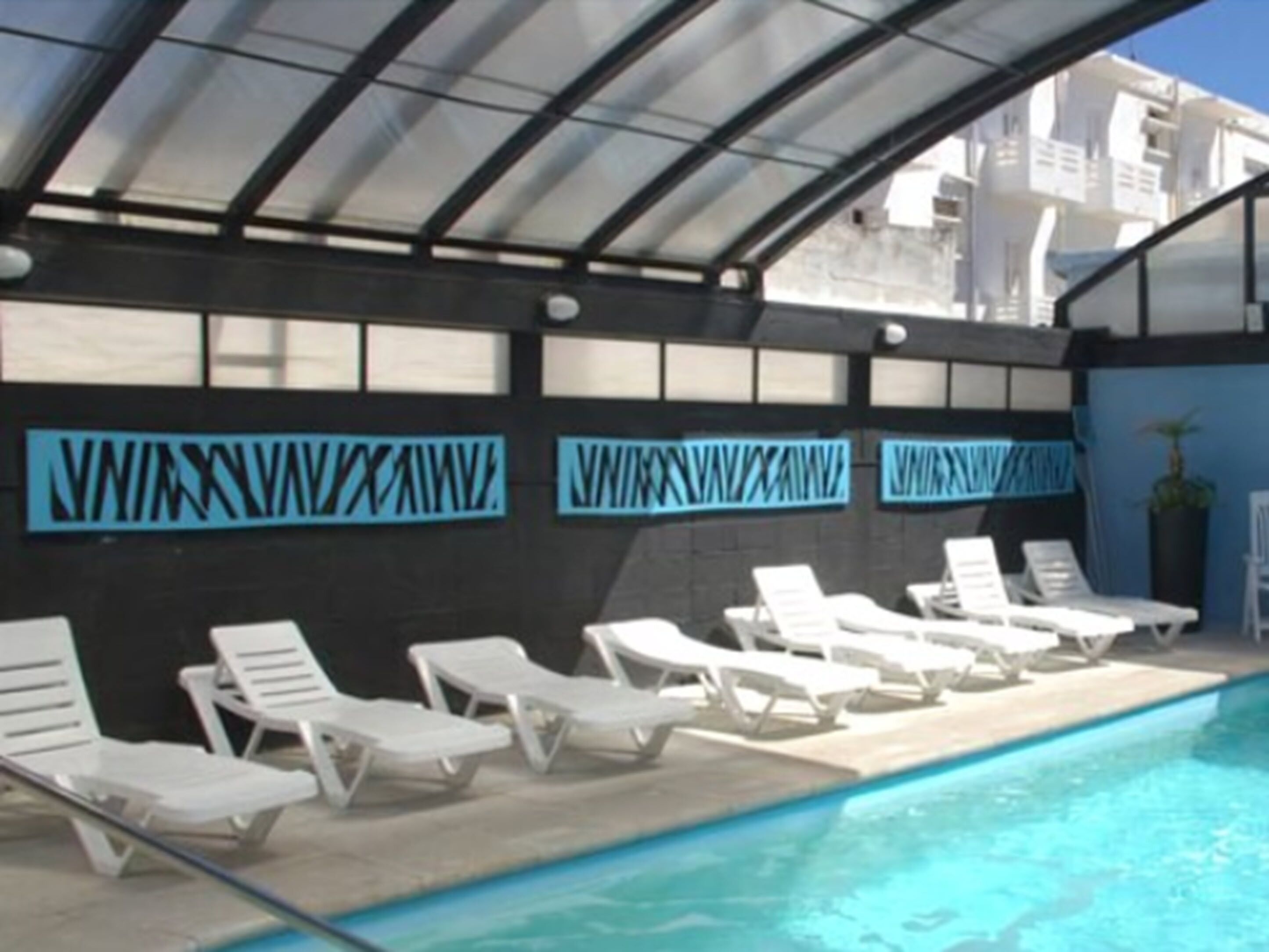 indoor pool, seasonal outdoor pool, pool loungers